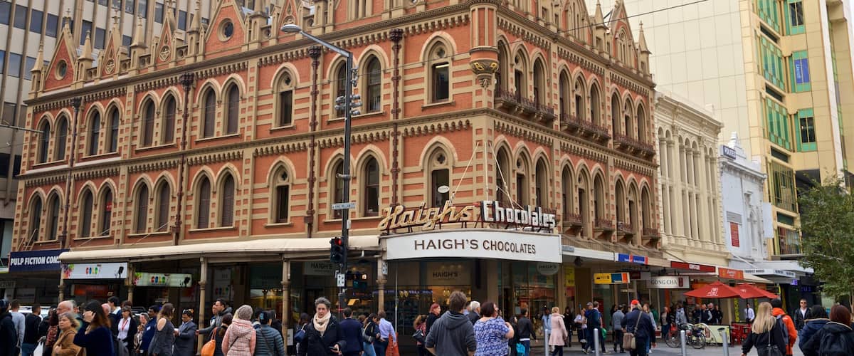 Beehive Corner Building showing a city, heritage architecture and street scenes