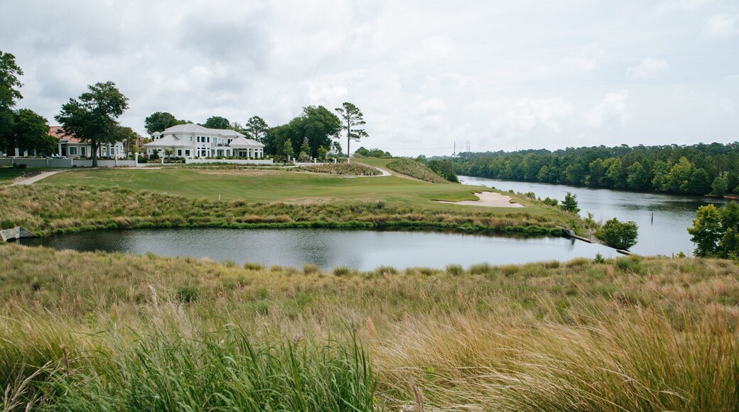 Grand Dunes Golf Course featuring a house and a river or creek