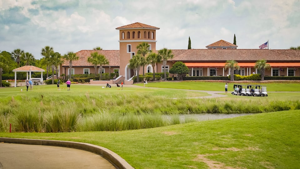 Grand Dunes Golf Course featuring golf as well as a small group of people
