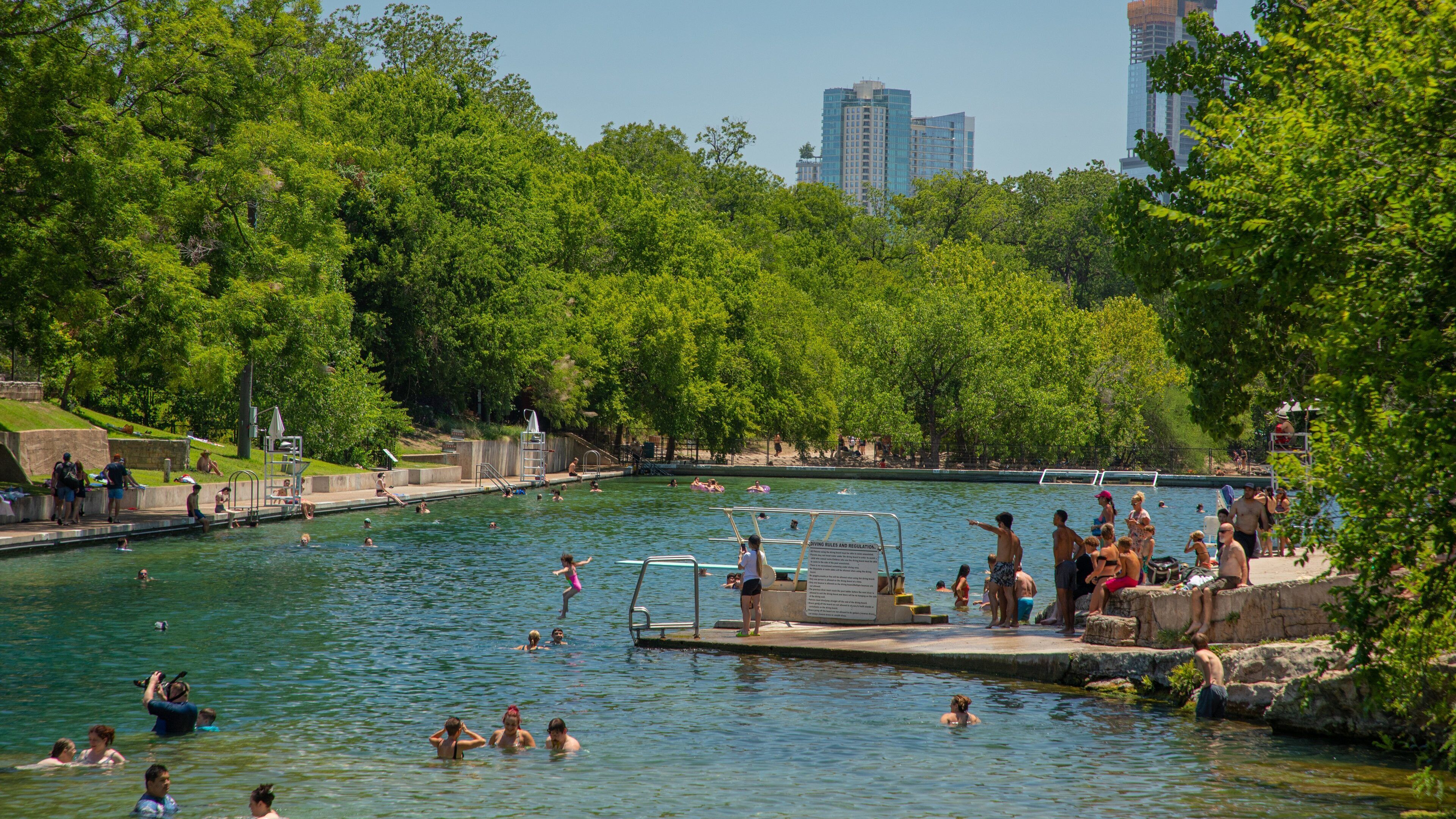 Barton Springs Pool featuring a river or creek and swimming