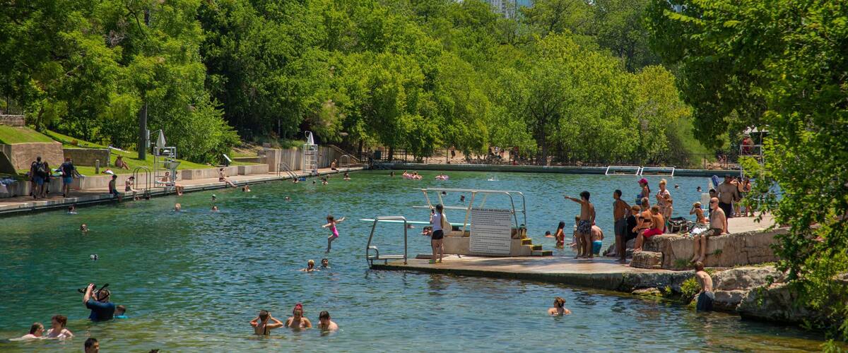 Barton Springs Pool featuring a river or creek and swimming