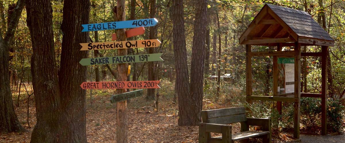 Carolina Raptor Center which includes a garden, signage and forests