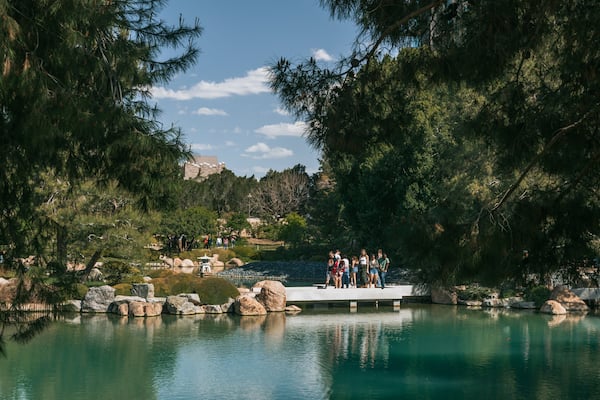 Japanese Friendship Garden of Phoenix which includes a pond as well as a small group of people