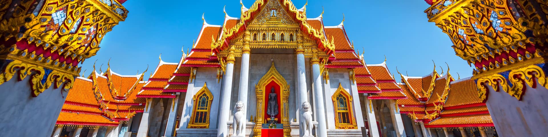 View through the gate to Wat Benchamabophit in Bangkok City, Thailand.