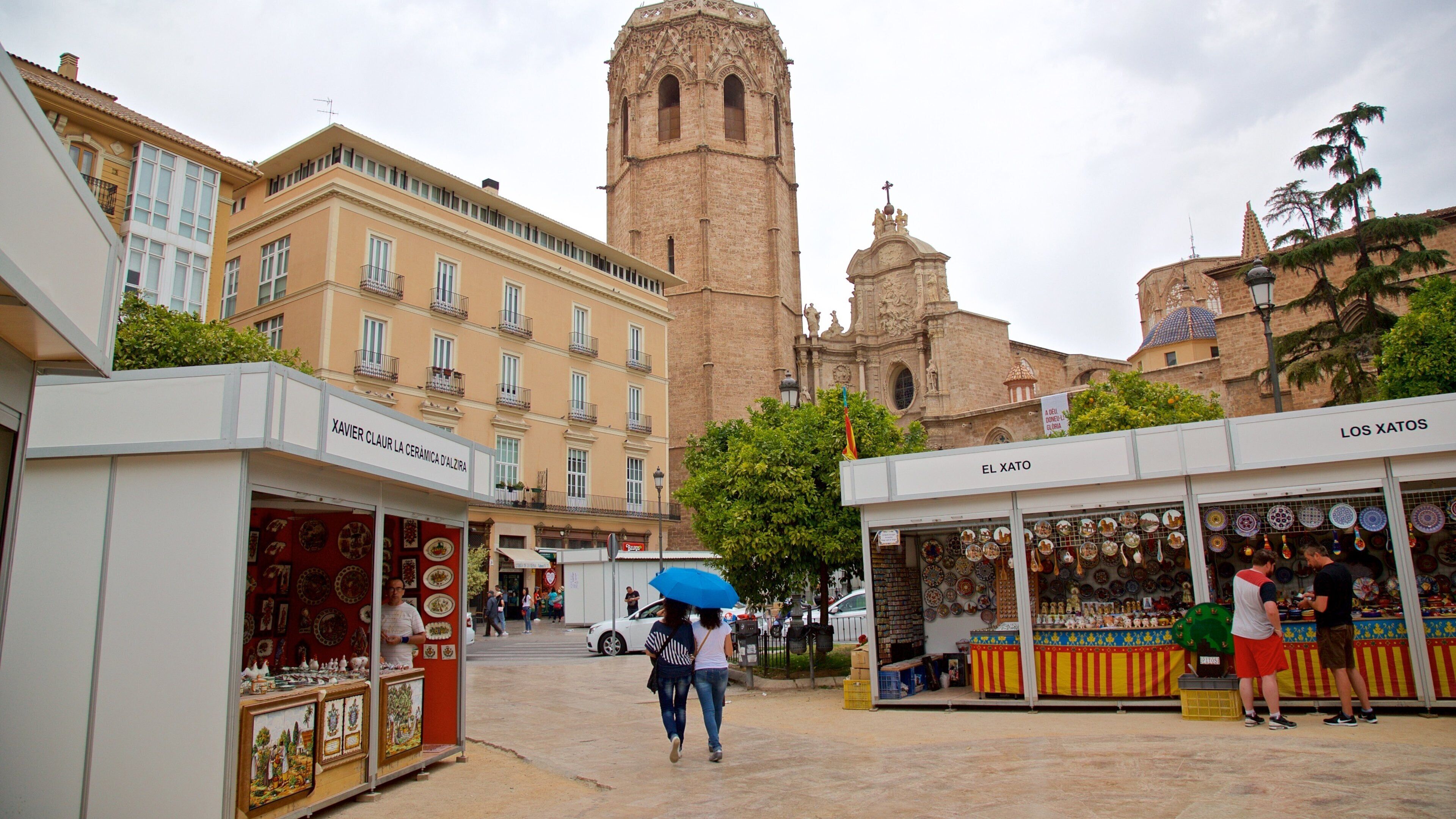 Miguelete Tower which includes heritage architecture and markets