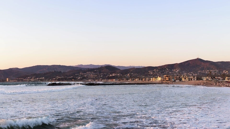 A panoramic view from the bronze mermaid statue at Soter's Point. The place was just a strip of rocky breakwater area until it was developed a few years back. Now park goers and visitors frequent the once neglected place.
