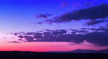 The inlet to the harbor becomes a spectacular scene at dusk.