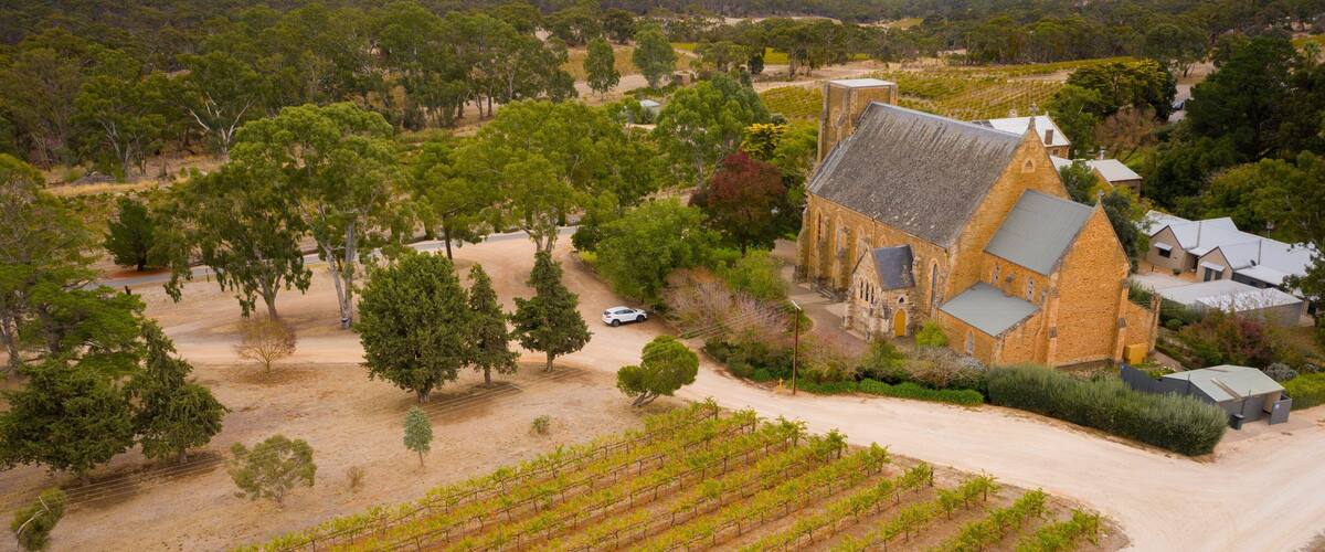 Sevenhill Cellars showing a church or cathedral, landscape views and farmland
