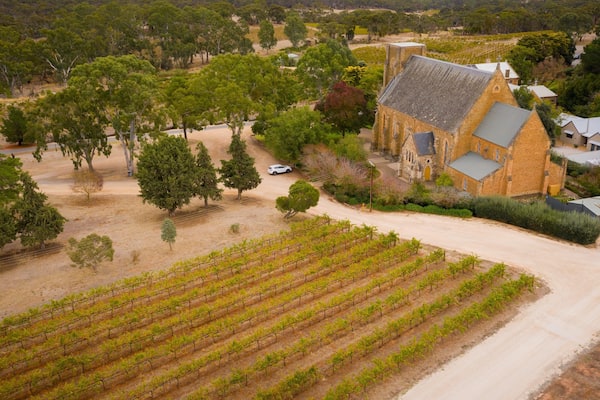 Sevenhill Cellars showing a church or cathedral, landscape views and farmland