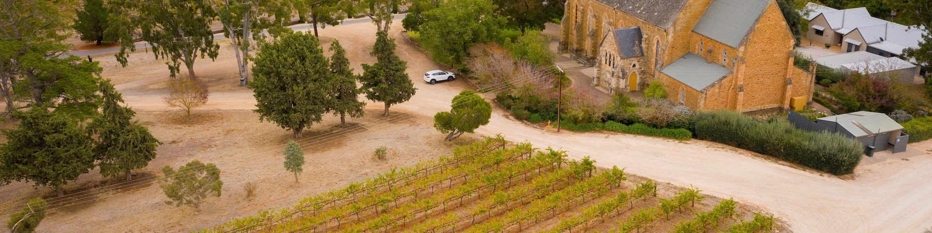 Sevenhill Cellars showing a church or cathedral, landscape views and farmland