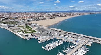 Las Arenas Beach At Valencia In Valencian Community Spain. Urban Beach. Bay Water Scenery. Downtown City. Las Arenas Beach At Valencia In Valencian Community Spain. Peaceful Landscape.
