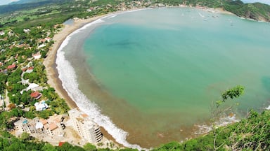 San Juan del Sur featuring tropical scenes, a bay or harbor and a sandy beach