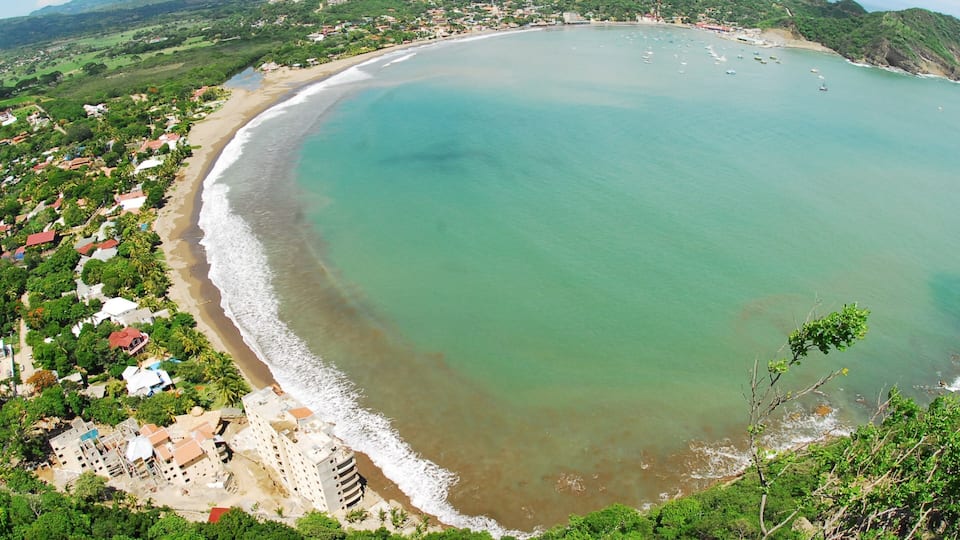 San Juan del Sur featuring tropical scenes, a bay or harbor and a sandy beach