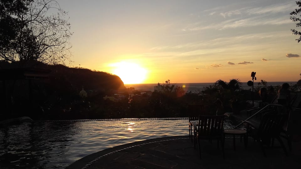 Pelican Eyes Resort in San Juan del Sur, Nicaragua. Amazing infinity pool with a bar. The perfect place to watch a sunset in SJDS. #sunsets #surfsudsandsights #travel #Nicaragua