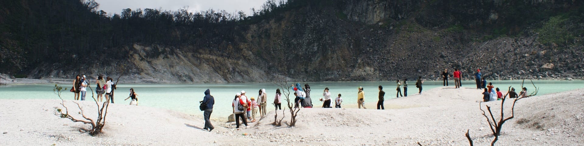 Bandung featuring a lake or waterhole and hiking or walking as well as a large group of people