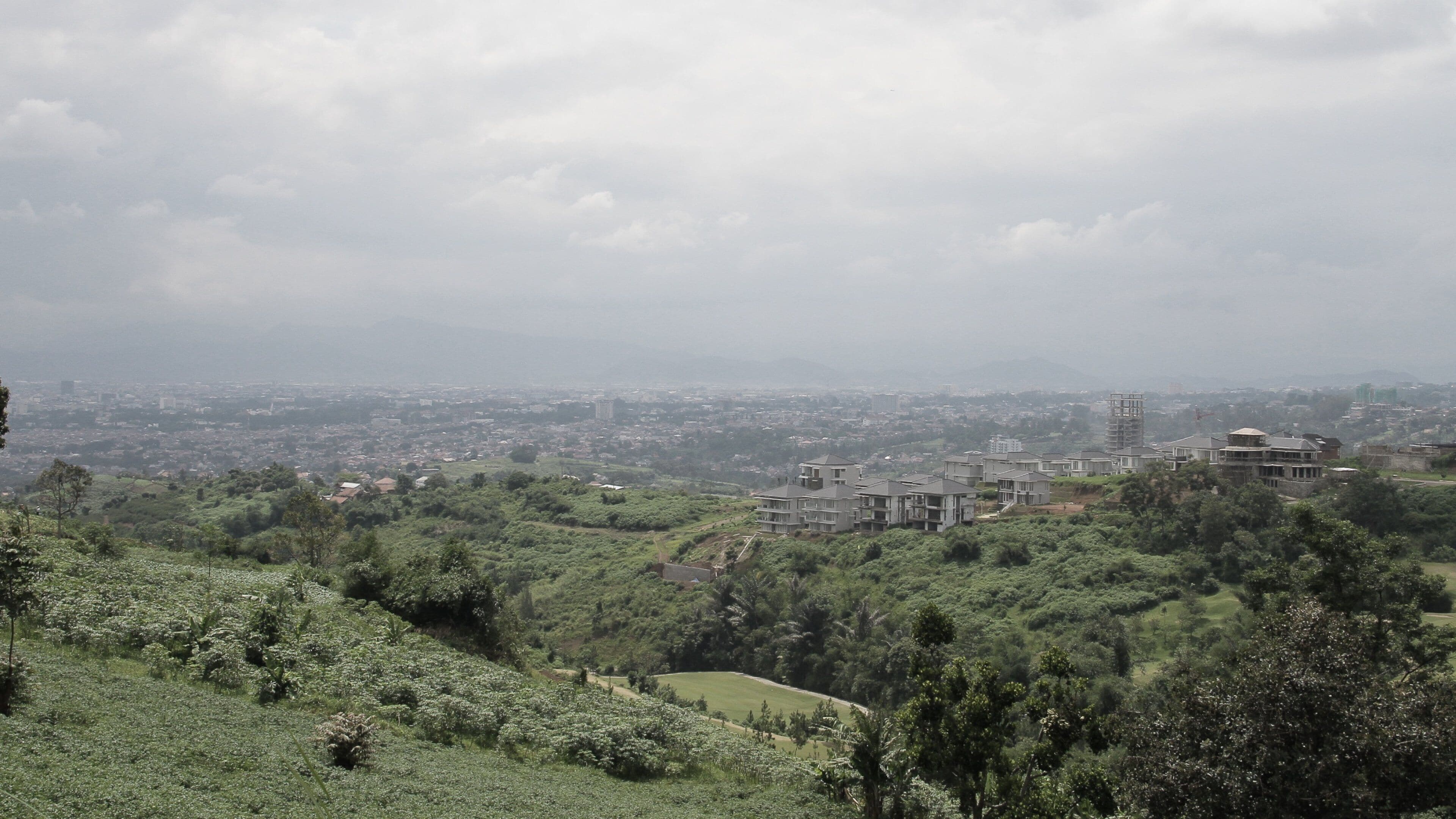 Bandung which includes mist or fog and landscape views
