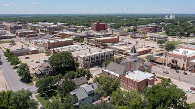 Afternoon sun shines on the historic buildings of downtown Emporia, Kansas, USA.