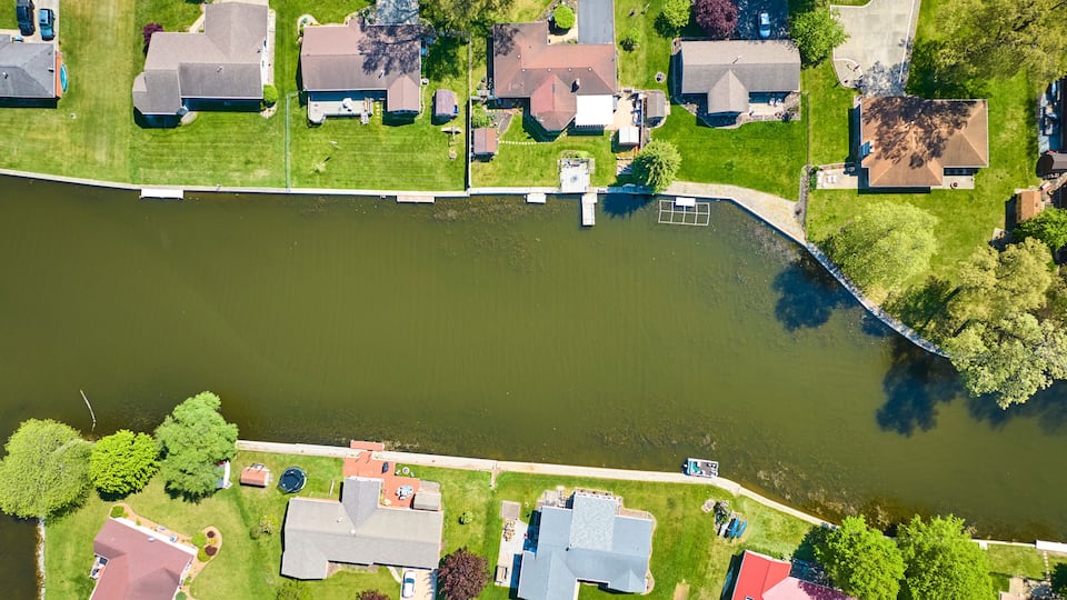 Aerial View of Suburban Riverside Homes with Docks, Warsaw, Indiana