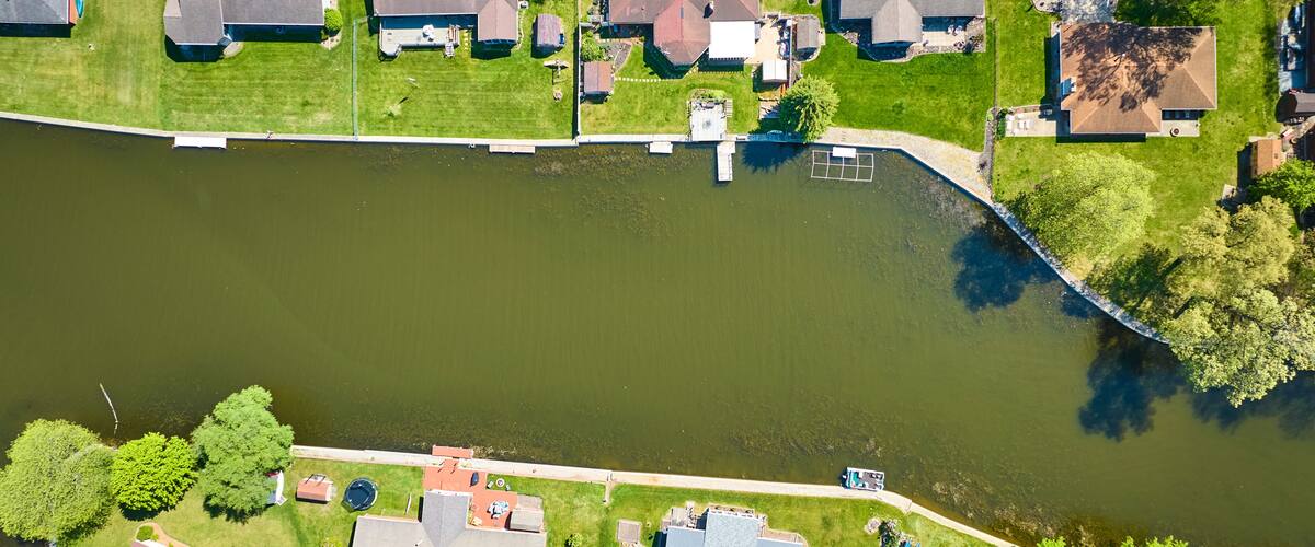 Aerial View of Suburban Riverside Homes with Docks, Warsaw, Indiana