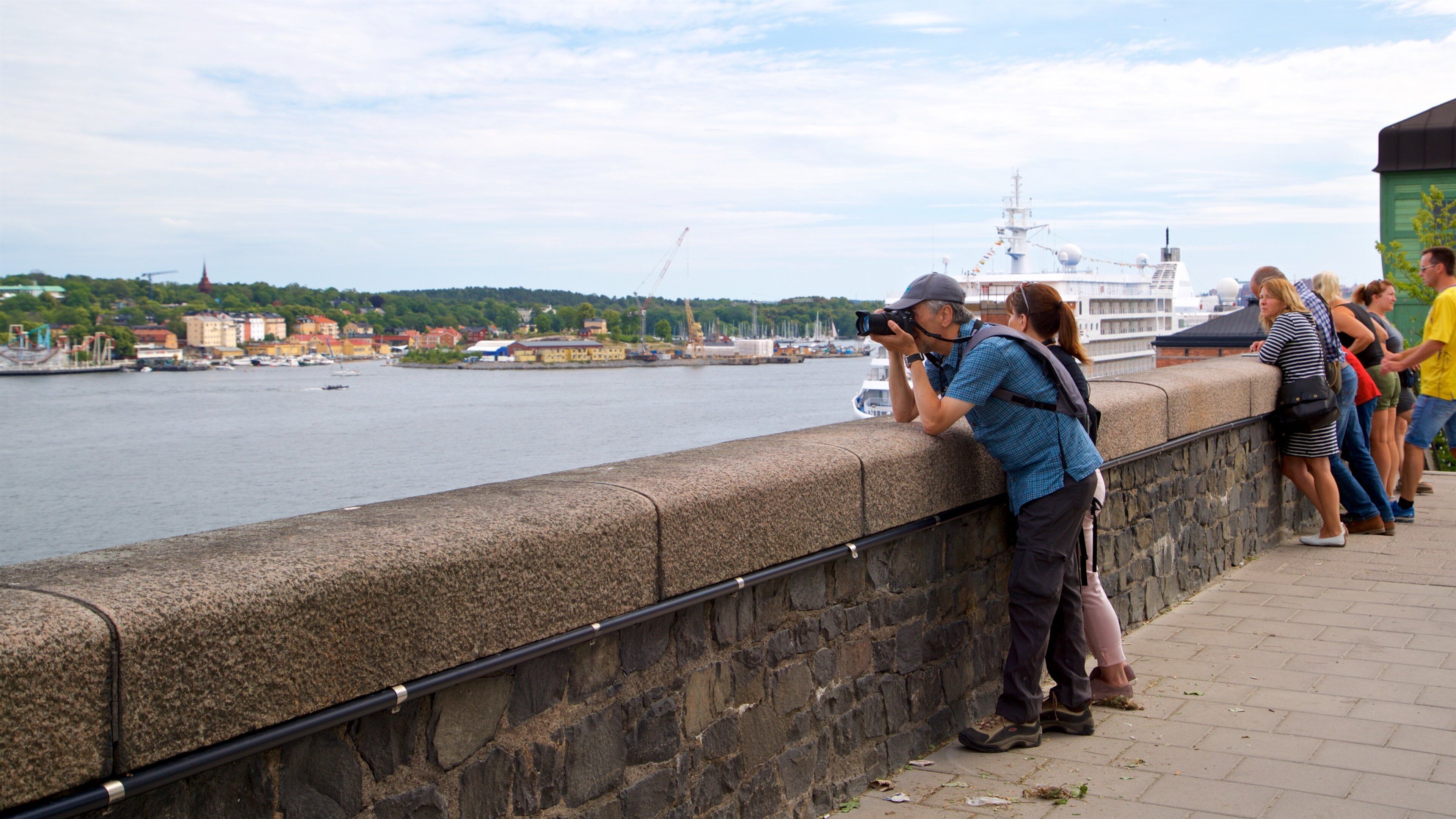 Fjallgatan Scenic Lookout featuring a bay or harbor as well as a couple