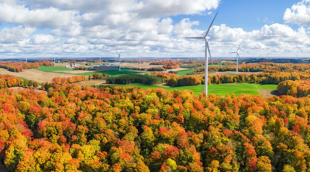 Autumn sunny day with wind turbines in central Michigan farmland near Cadillac Michigan