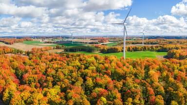 Autumn sunny day with wind turbines in central Michigan farmland near Cadillac Michigan