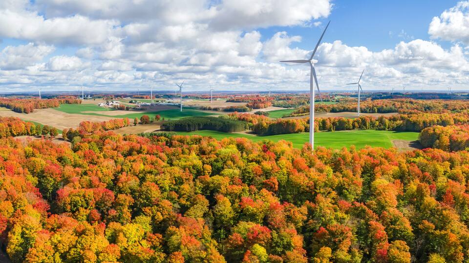 Autumn sunny day with wind turbines in central Michigan farmland near Cadillac Michigan
