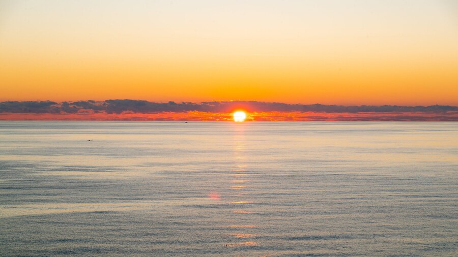 Gulf Coast State College featuring a sunset and general coastal views