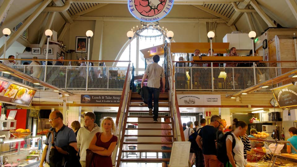 Fish Market showing interior views and markets as well as a large group of people