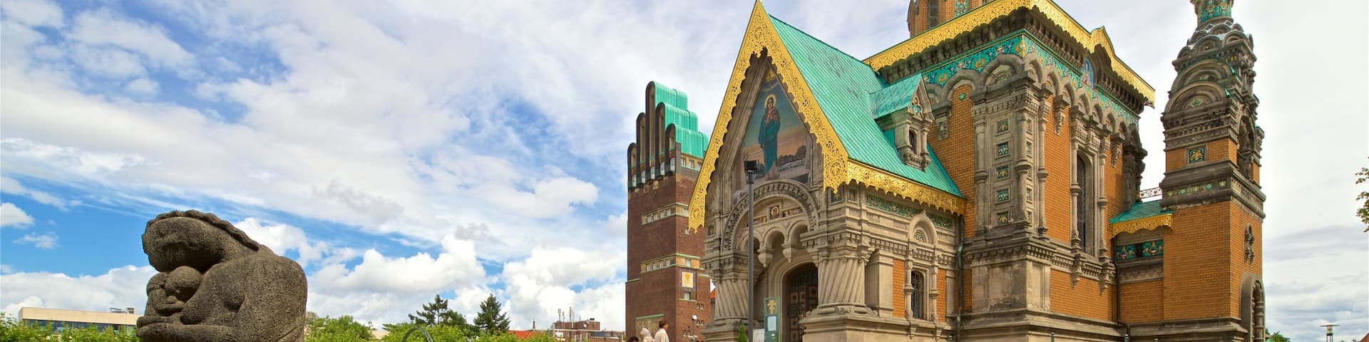 Russian Chapel which includes heritage architecture and a church or cathedral as well as a small group of people