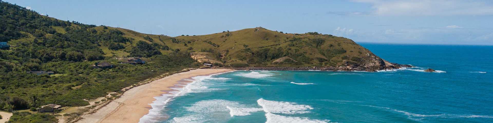 Aerial view of Silveira beach - Garopaba. Beautiful beach between mountains in Santa Catarina, Brazil