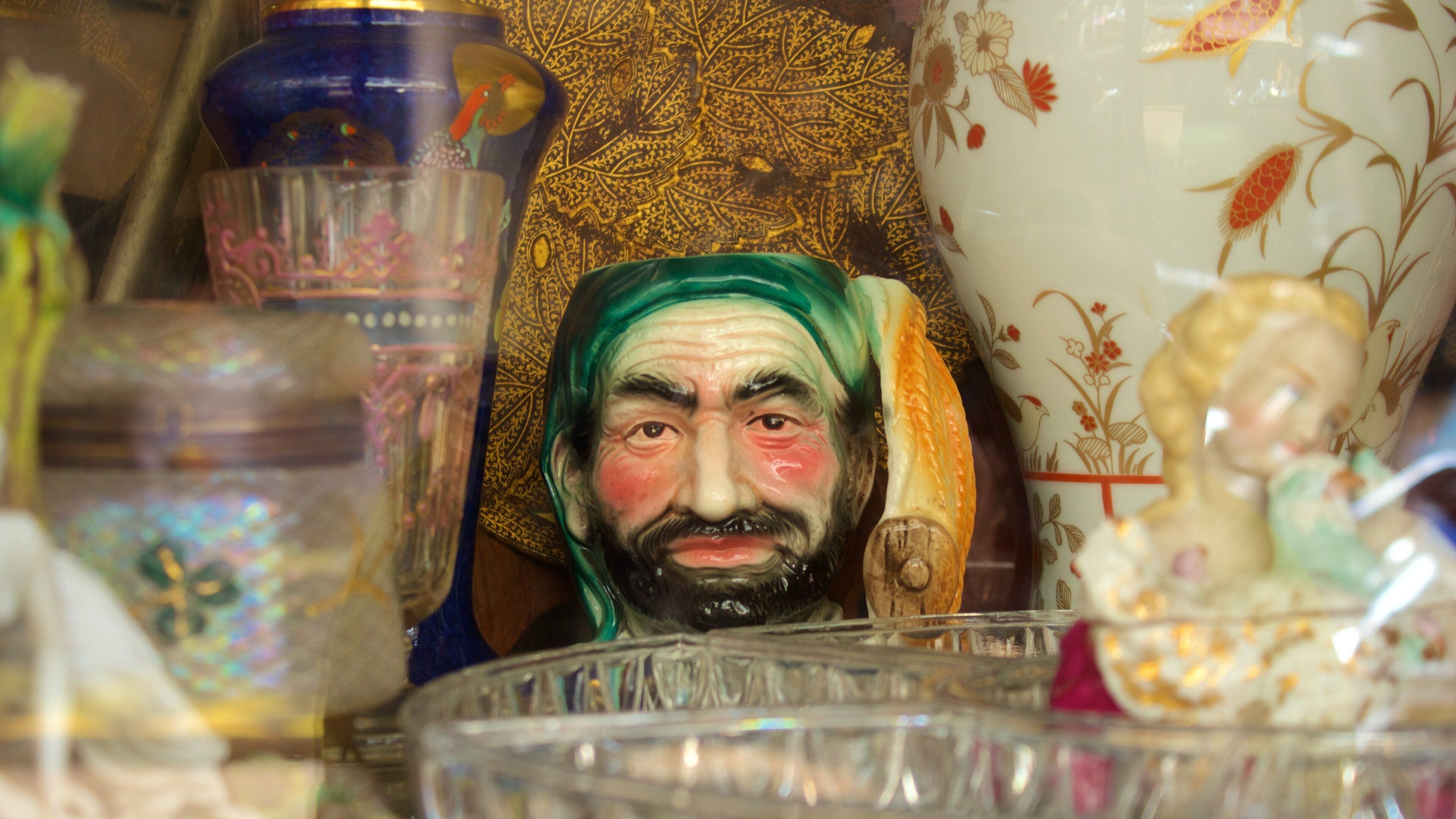 Chor Bazaar featuring a statue or sculpture and shopping