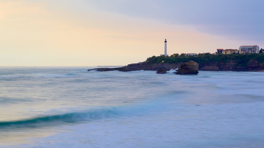 Aquitaine showing a lighthouse, general coastal views and a sunset