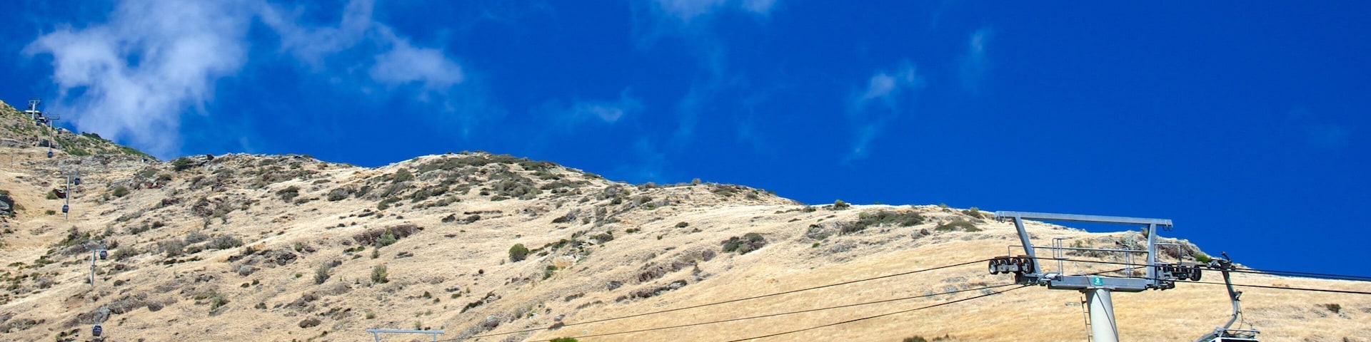 Telecabine de Christchurch que inclui uma gôndola e montanhas