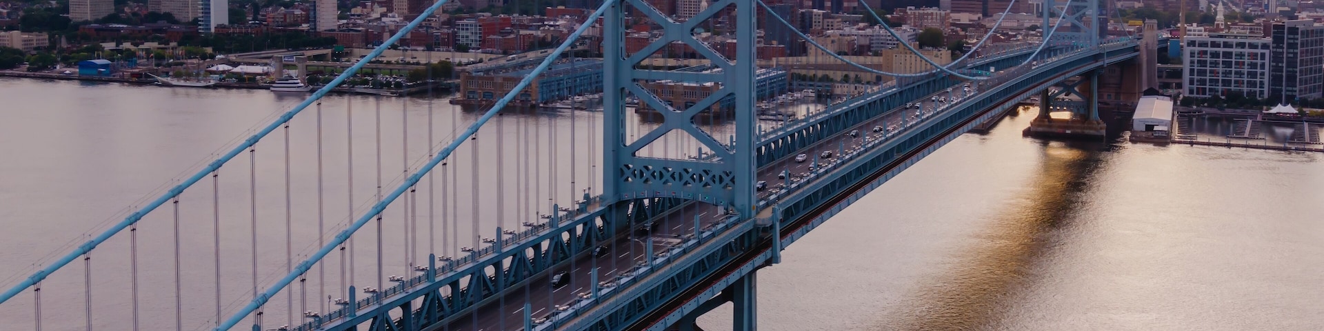 Benjamin Franklin Bridge crossing the Delaware River looking towards downtown Philadelphia, Pennsylvania, United States.