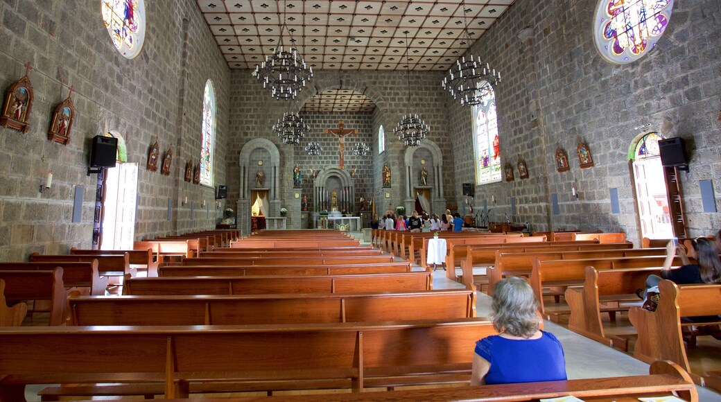 Sao Pedro Church featuring a church or cathedral, interior views and religious aspects
