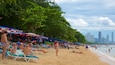 Dongtan Beach featuring a beach as well as a large group of people