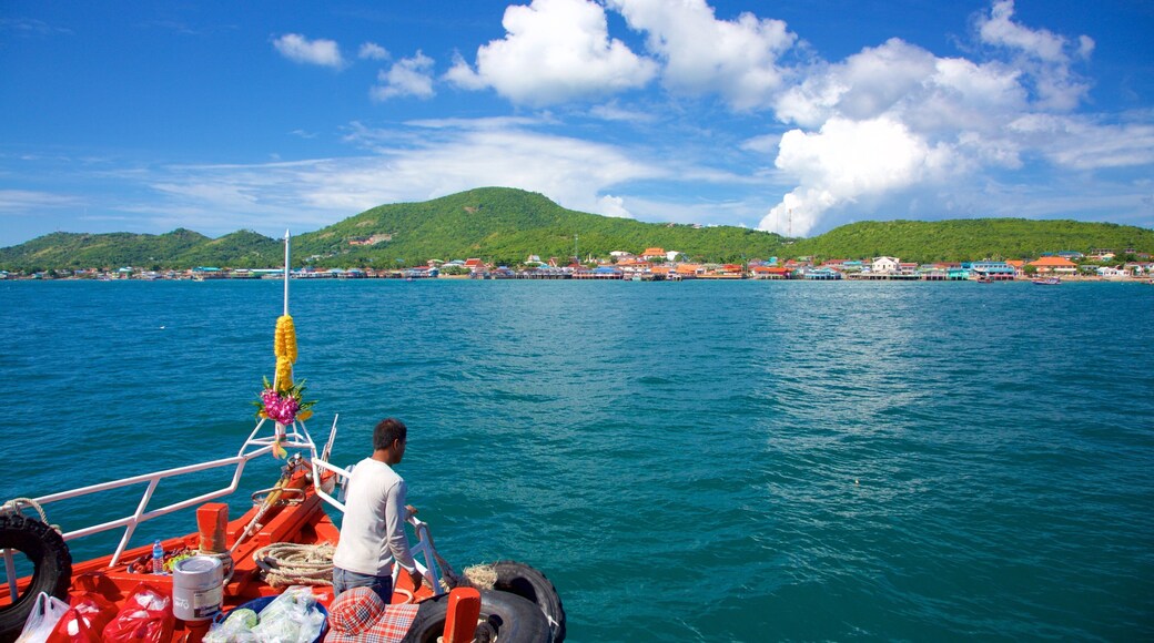 Na Baan Pier showing boating and general coastal views as well as an individual male