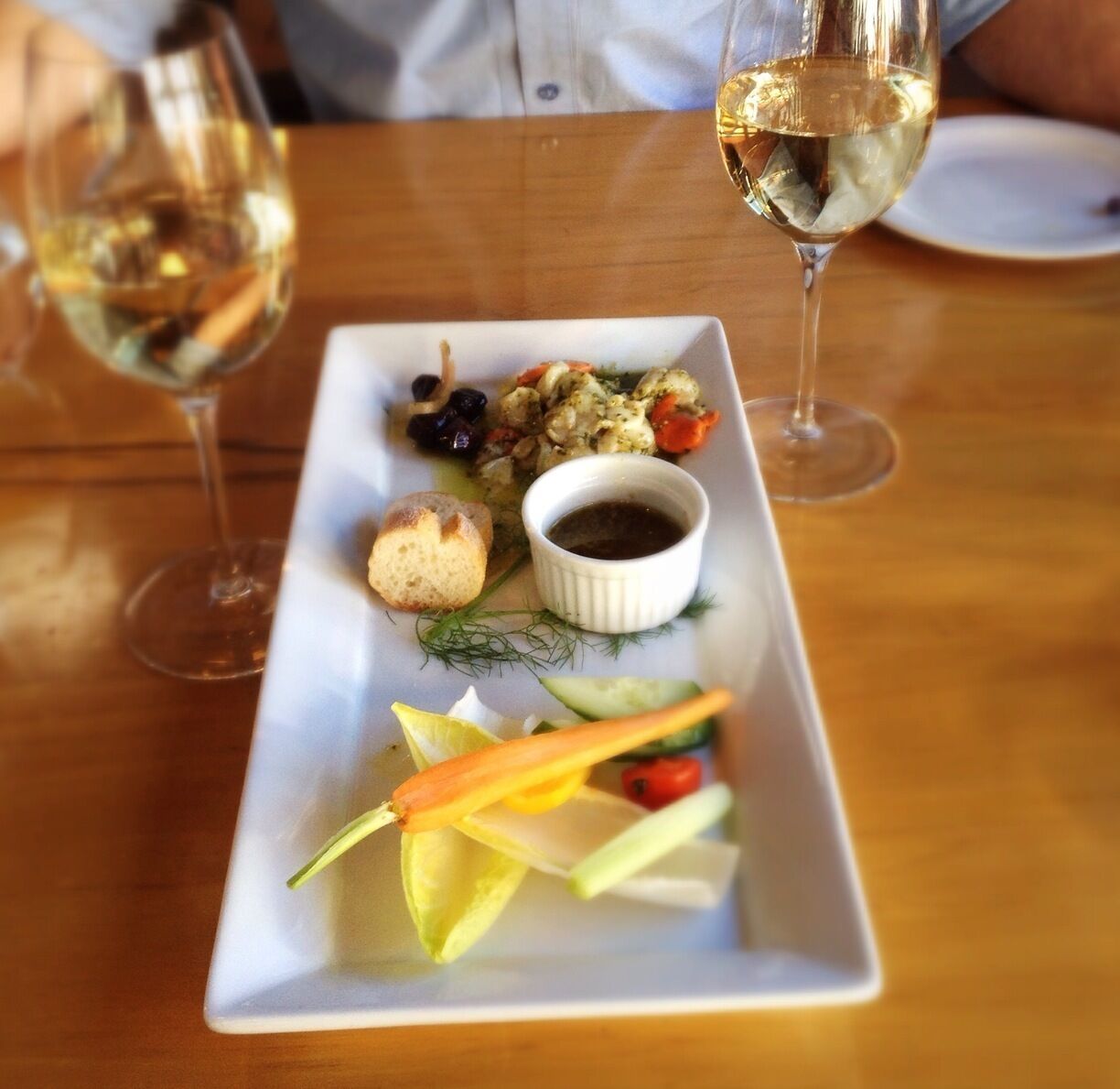 Lunch entrée at Gibston Valley Winery. Scallop ceviche with La Dulcinee Pinot Gris.  The mains and desserts are equally delicious!