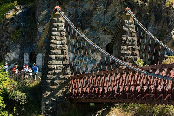 Kawarau Suspension Bridge which includes a bridge as well as a small group of people