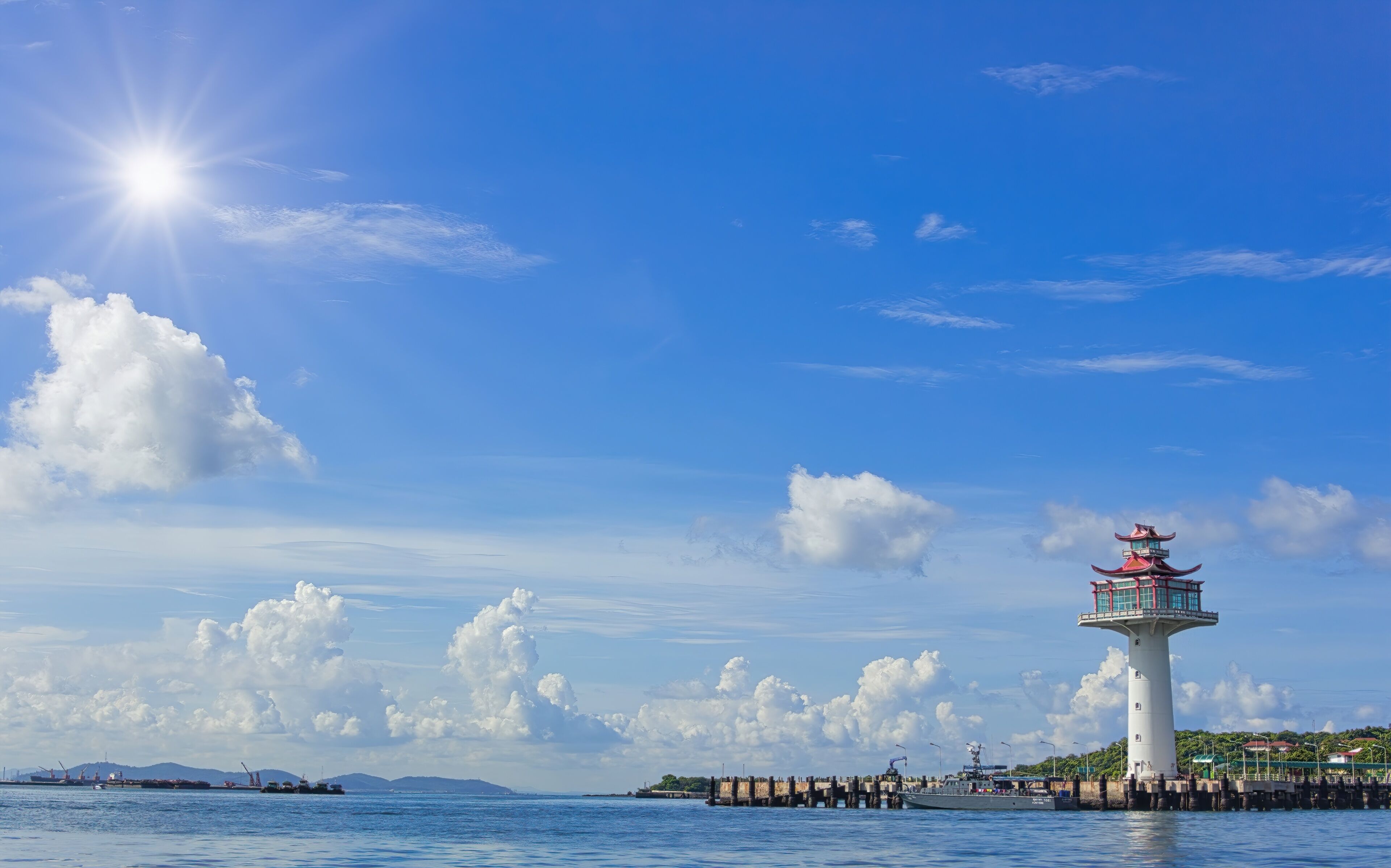 lighthouse of Ko Sichang island, Chonburi, Thailand. (Premium looks development)