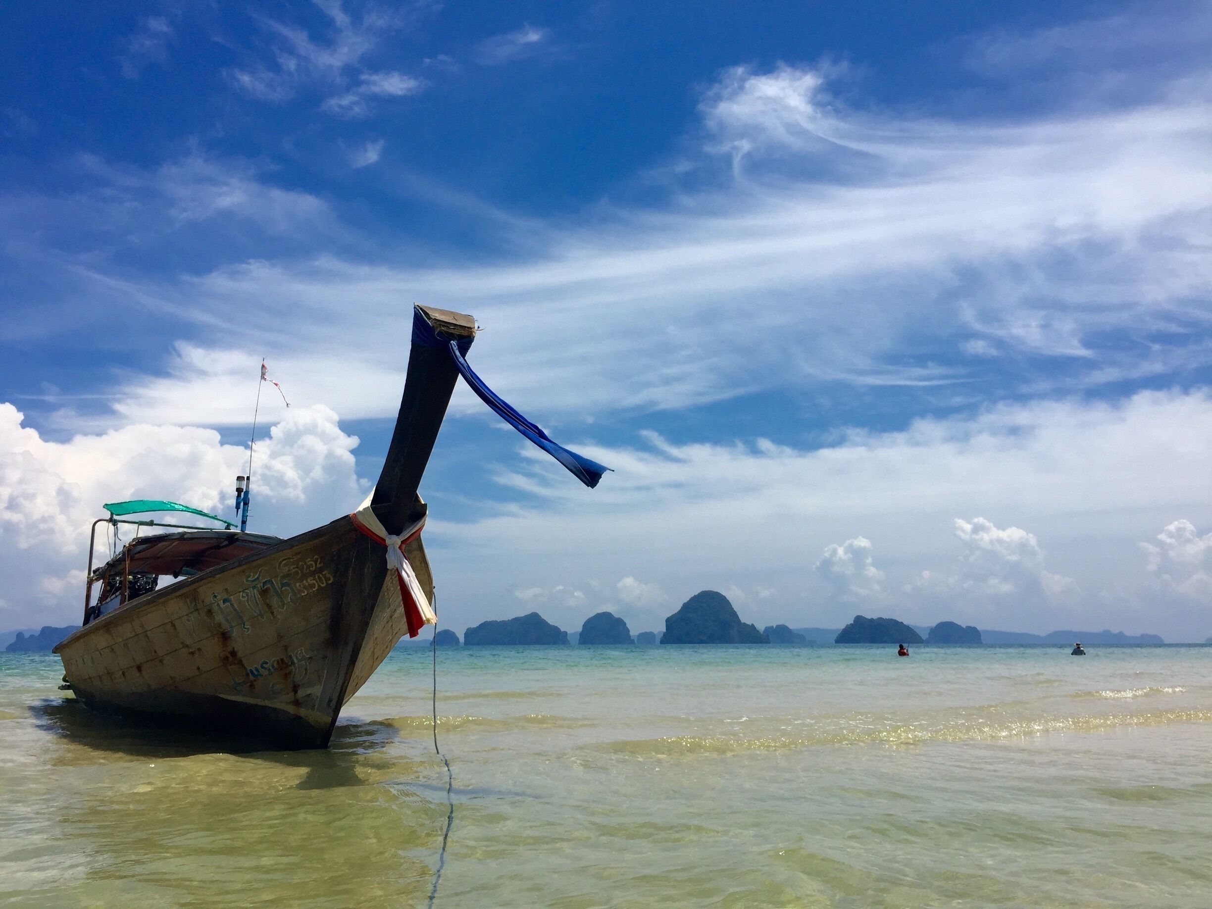 longboats of Tubkaek Beach. just waiting to take you to the Hong Islands in the distance. 