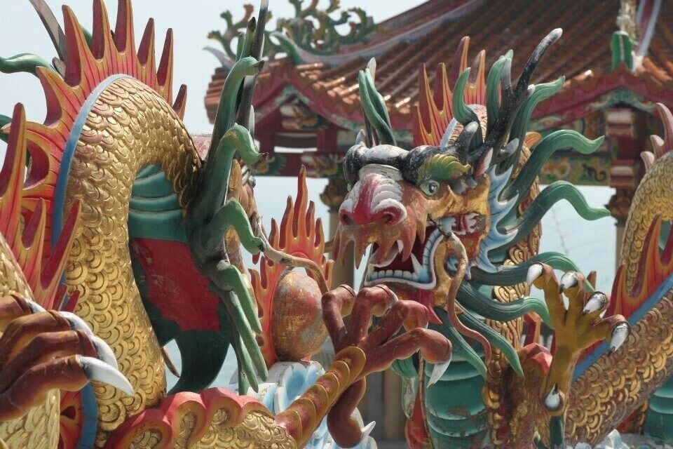 The architecture in Thailand is stunning! 

These dueling dragons are a pair of hundreds that line the walls of the temple at Wat Khao Takiap.

Be careful of the monkeys!! They WILL steal anything that isn't secured - that includes hats, bags, phones, food and dignity!

Climb the epic set of stairs to reach the bell temple!

I took this on my Canon 100D back in 2012 - it's an old photo but I love it!