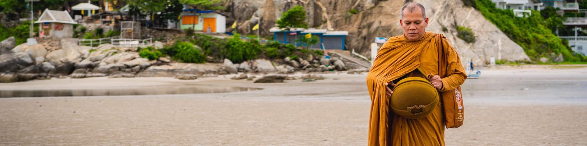 Thai Views | Wat Khao Takiap: Though I have been living in the Asia for about 8 years and with a majority of Asian nations being predominantly Buddhist, I have never truly looked into the practice. Sure, I’m vaguely familiar with the meditation and enlightenment aspect of it but that has been the limits of my knowledge. Recently I have decided to take a deeper look at the practice and in turn a deeper look into myself.
.
At the core of Buddhism are The four Noble Truths, the first of which being that in life there is suffering. However the teachings guides you through the reasons for suffering and how to end suffering. One major cause to human suffering is our desire, craving such things as material goods and then leading to our attachment to them. With this identified one can choose to crave less and understand that the only thing permanent in life is impermanence. All that we have now will not last forever so why get attached to them when they will only cause us suffering when they are gone. I’m not talking on a superficial level that is only thought about in times of crisis but on a day to day basis.
.
Looking at this monk walking on the beach at the crack of dawn in only a robe and without shoes, I get it now. I don’t think I could be as disciplined as this but I got to start somewhere.
.
.
.
.
#sonyalpha #sonya7riii #travelblogger #travelvlogger #travelgoals #travelguide #wanderluster #wandering #instatravel #instavacation #natgeoyourshot #lpfanphoto #troveon #southeastasia #beautifulseasia #travelsoutheastasia #thailand #huahin #igthailand #thailandinsider #amzthld #explorethailand #visitthailand #vscothailand #gulfofthailand #buddha #buddhism #buddhist #buddhistmonk #buddhastatue