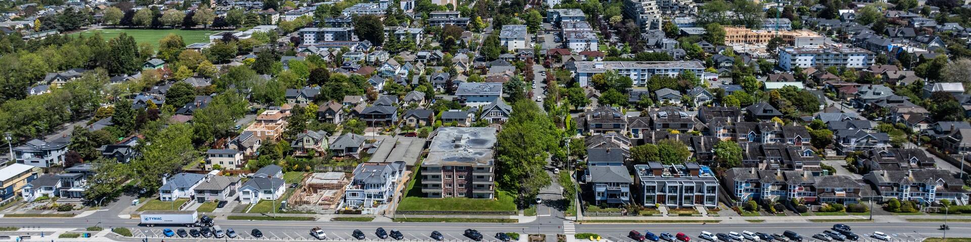 aerial cityscape view of Victoria, the capital of British Columbia, from Dallas Rd at Salish Sea, across James Bay district in front, Downtown, Burnside and Victoria West in background