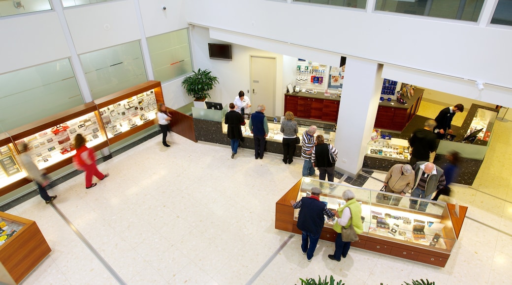 Royal Australian Mint showing interior views as well as a large group of people