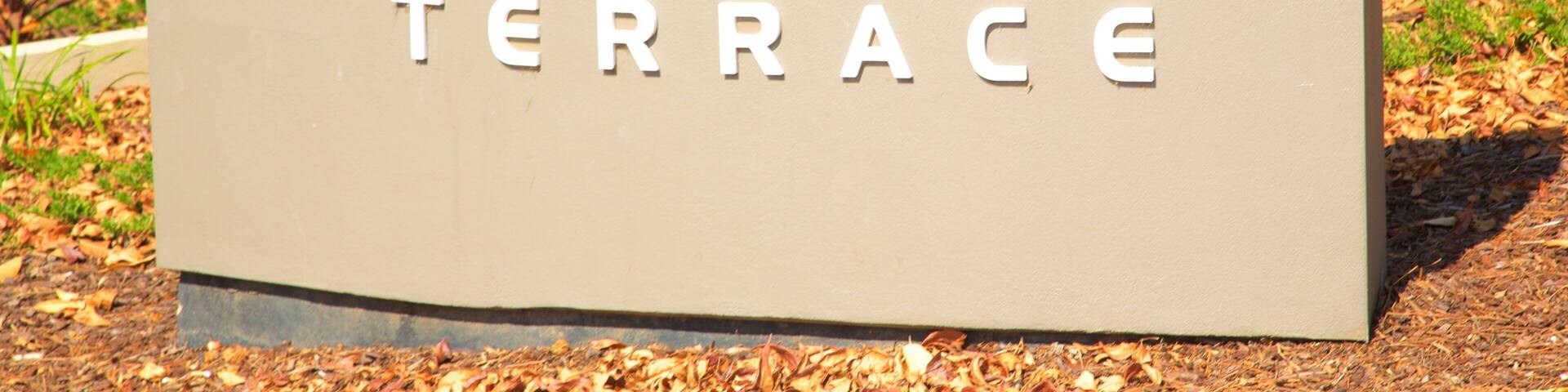 Manuka Shopping Centre featuring signage