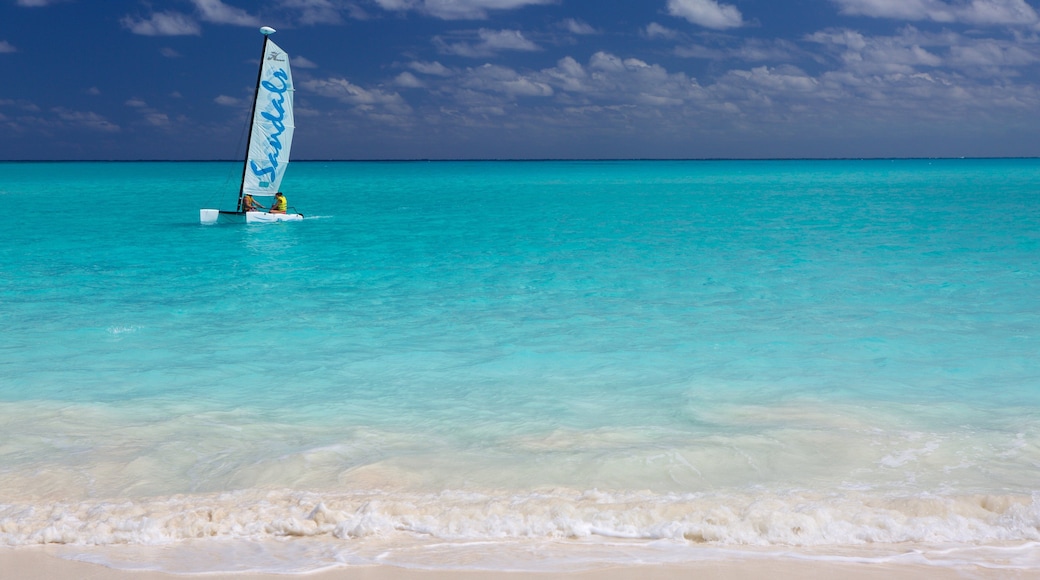 Emerald Bay showing a sandy beach, tropical scenes and sailing