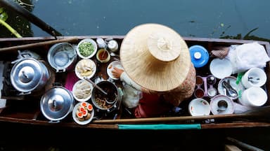 Seller on boat , floating market ,Thailand