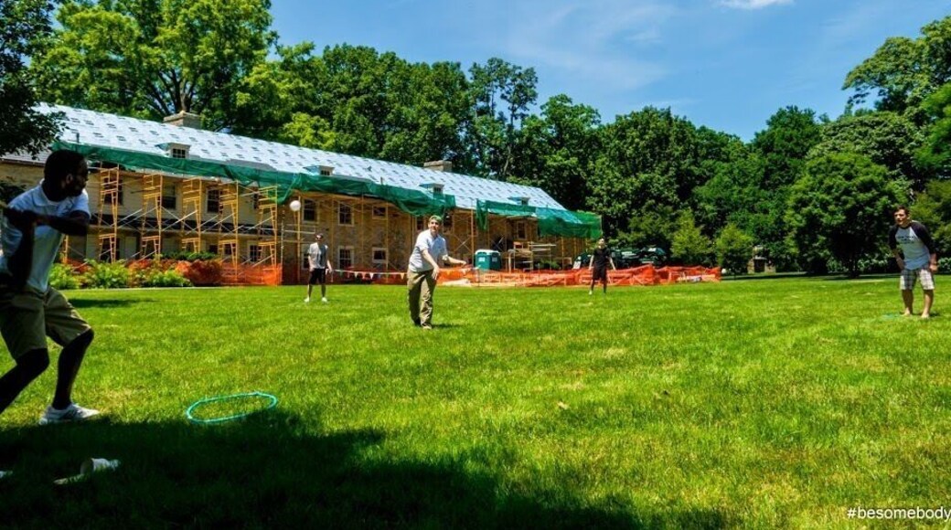 This College is amazingly open to the public people are strolling everywhere. There is a public pool, a nature walk and lots of old fashioned buildings. Feel free to come look around if you have kids bring bread for the duck pond. I'm here to be a camp counselor and we are playing whiffle ball.